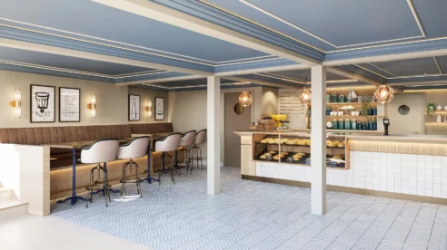 Modern café with cosy seating, a family enjoying pastries, and a bright, inviting ambience.