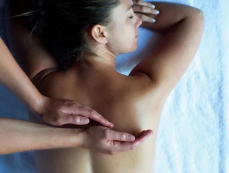 Relaxing massage therapy at a resort spa, enhancing wellness and tranquility.