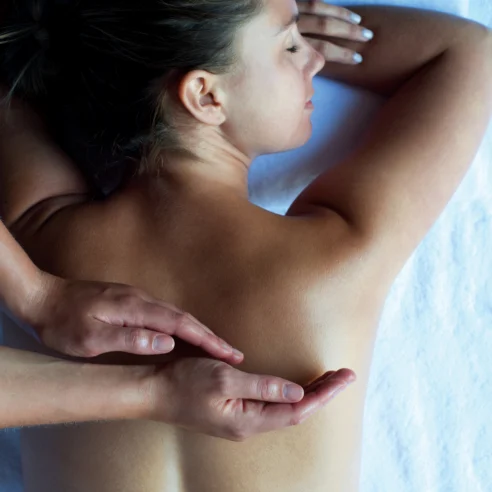 Relaxing massage therapy at a resort spa, enhancing wellness and tranquility.