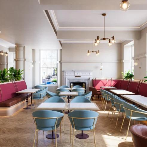 Stylish hotel dining area with elegant tables and plush seating, spacious and welcoming.
