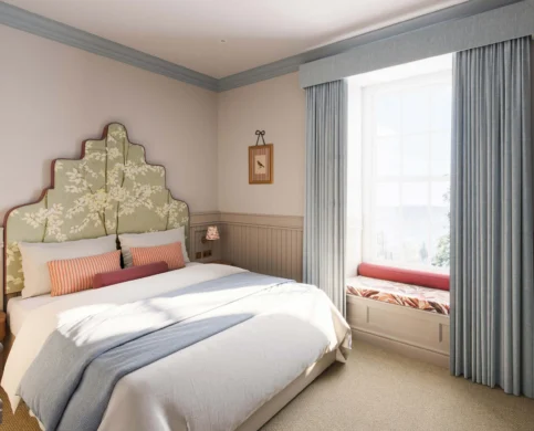 Serene hotel room with plush bed, elegant headboard, soft lighting, and inviting window seat.